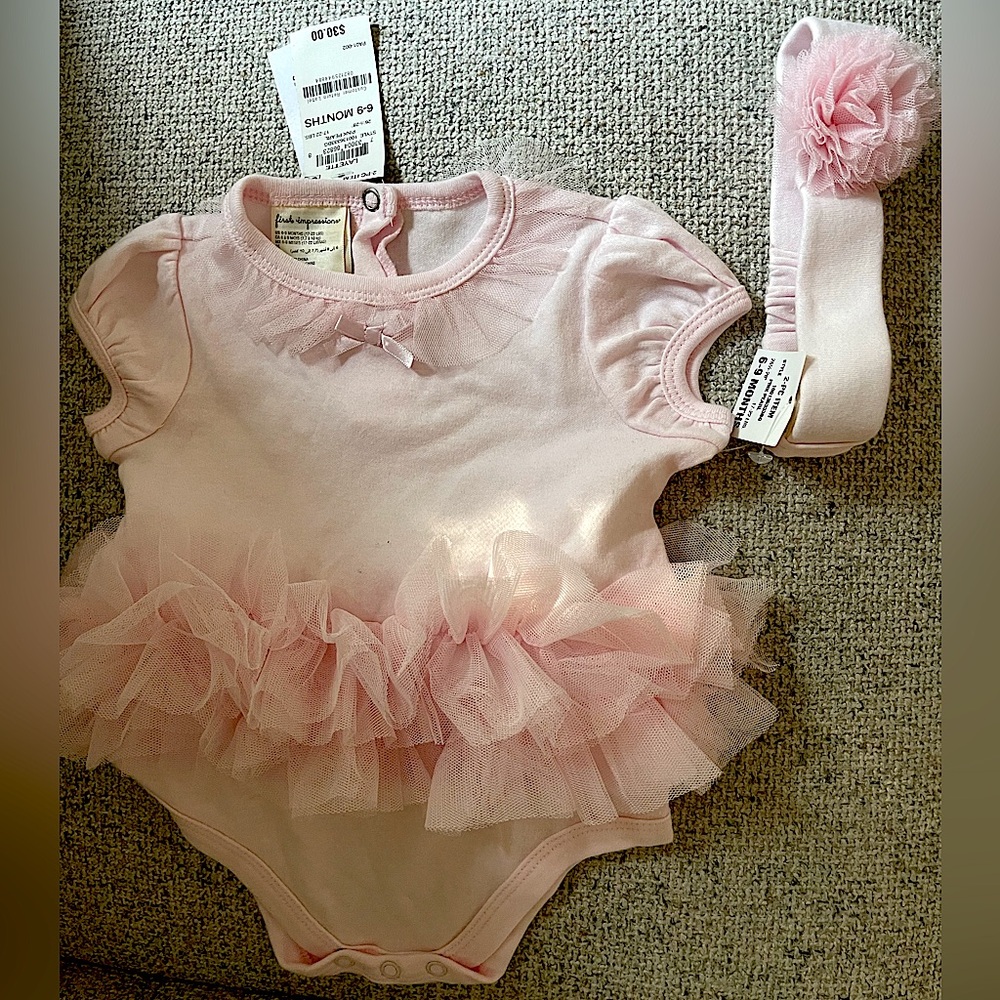 Baby pink body suit